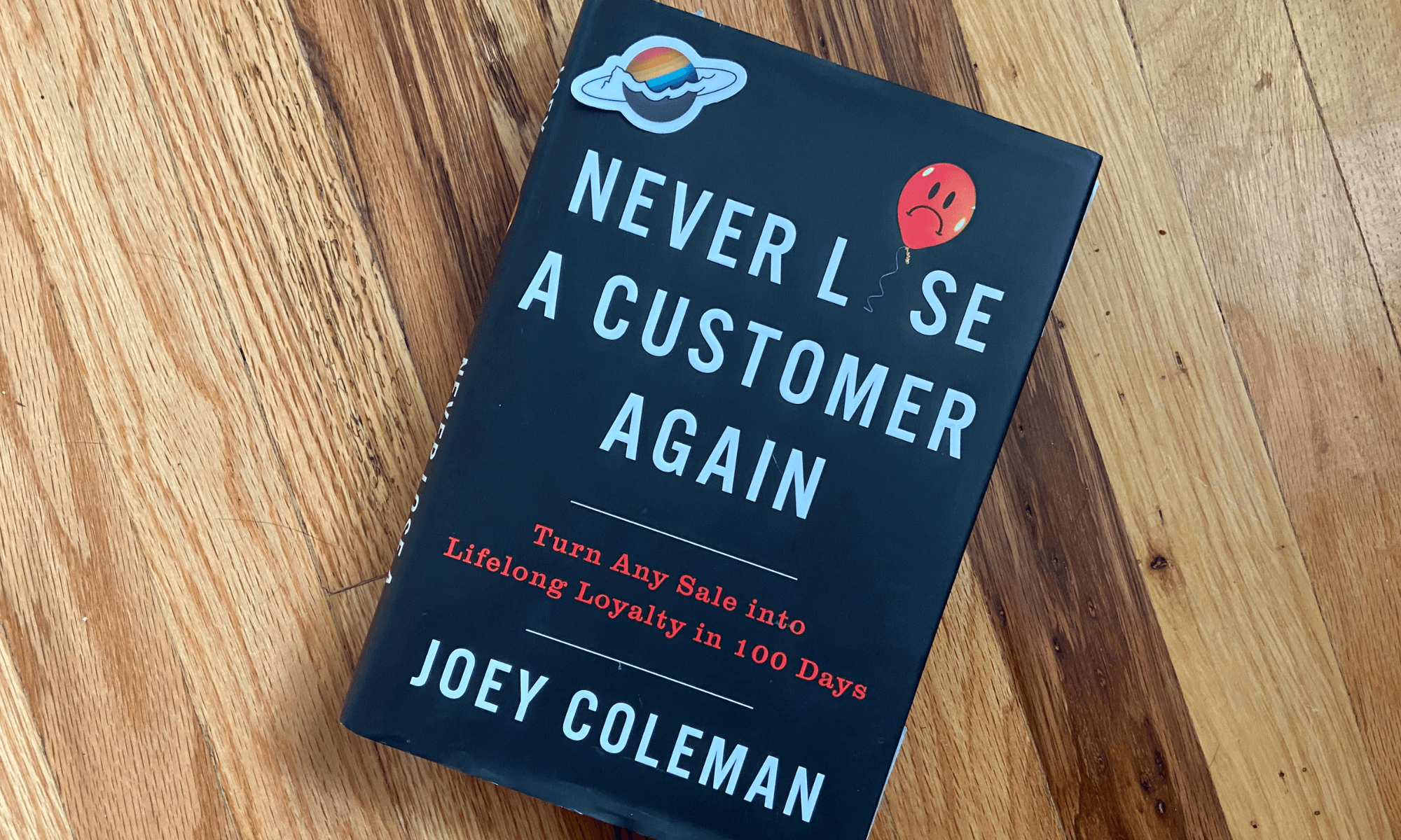 Photo of the book "Never Lose A Customer Again" by Joey Coleman